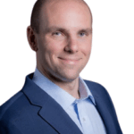 Joe Anderson, CEO and Founder of Connex Ecommerce, smiling in a professional setting, representing successful channel partnerships.